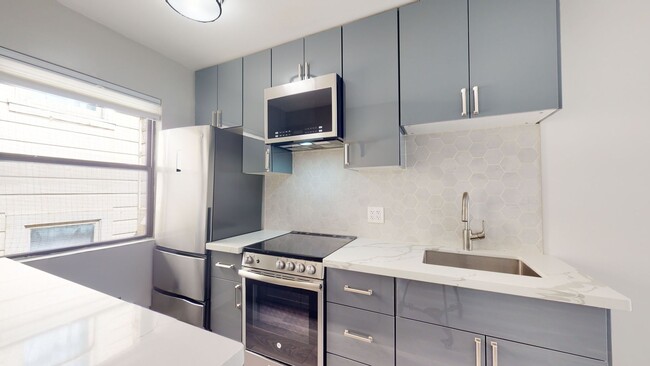 Building Photo - Remodeled modern 1 bedroom end unit, close...