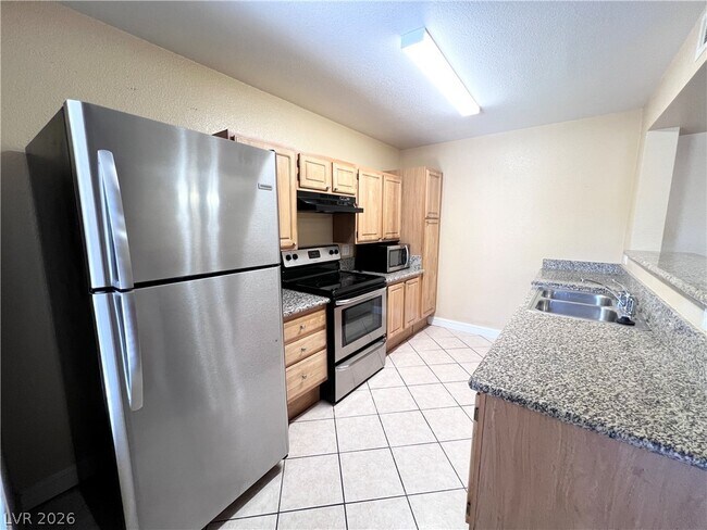 Building Photo - 5055 W Hacienda Ave
