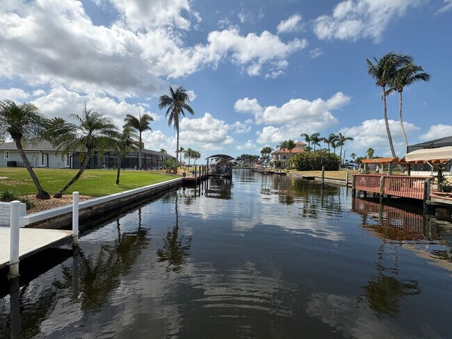 Building Photo - Beautifully Furnished Pool Home with Boat ...