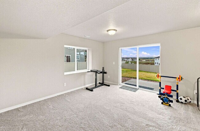 Building Photo - Beautiful 2025-Built 5 Bedroom Home with Finished Walk-Out Basement