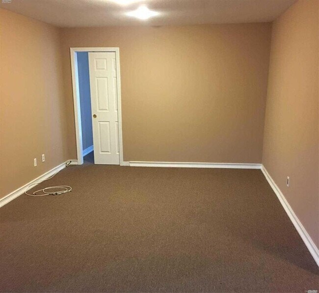 Building Photo - 211 Town House Village
