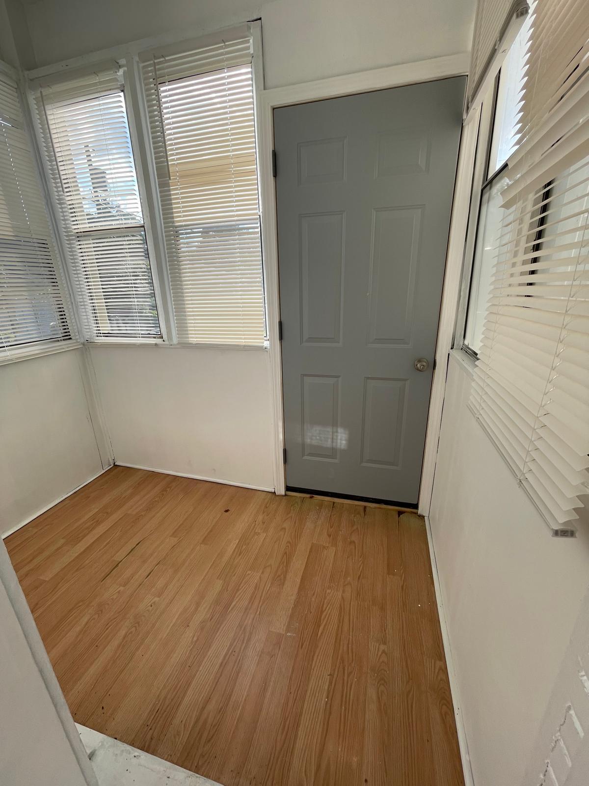 storage room with the door to the backyard - 5909 S Kingshighway Blvd