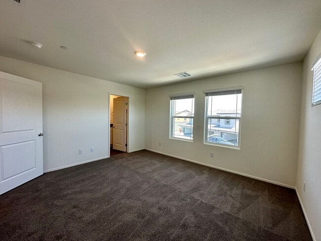 Building Photo - Cadence Modern 2-Story Townhome with Smart Features & Community Amenities