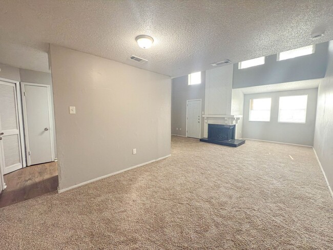 Building Photo - Two story townhouse style unit! Bedroom on second floor