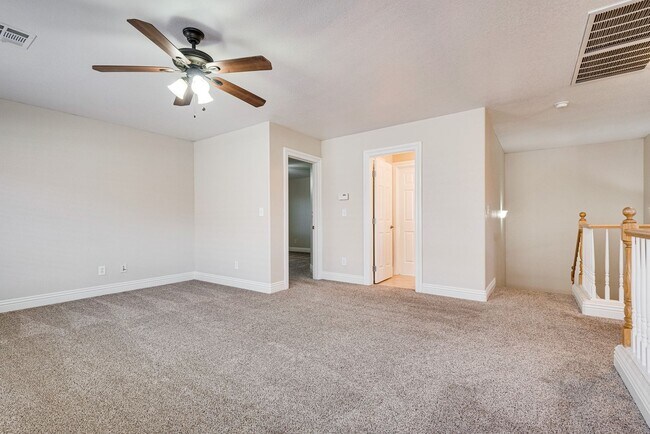 Building Photo - Spacious 3-Bedroom Home Featuring Downstai...