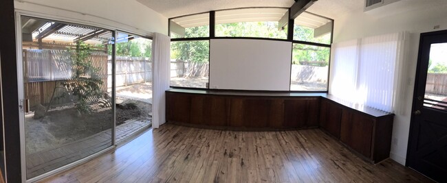 Building Photo - Sprawling 7 bedroom home available for sum...