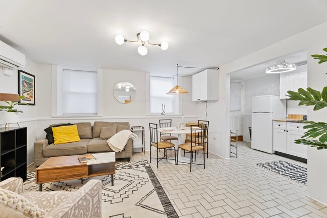 iving room toward dining and kitchen - 413 N Cayuga St