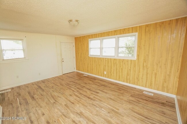 Building Photo - Lawn Care Included in Jville City Limits!