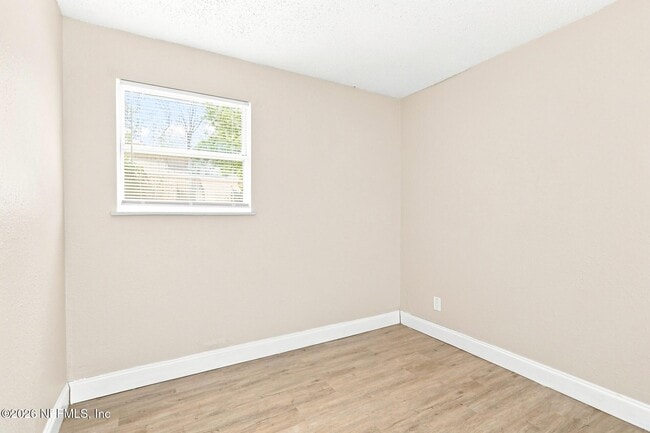 Building Photo - 6813 Tinkerbell Ln