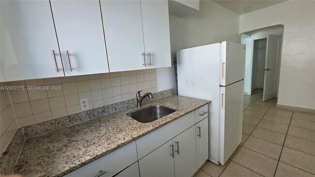 Building Photo - 7629 Dickens Ave