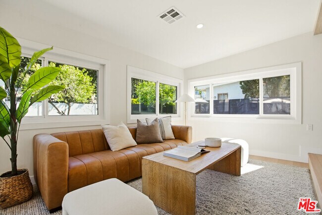 Building Photo - 7358 Paso Robles Ave