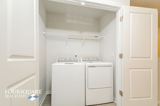 Building Photo - Modern 3-Story Townhome with First-Level Bedroom, Open Floor Plan & Community Pool – Prime RTP Lo...