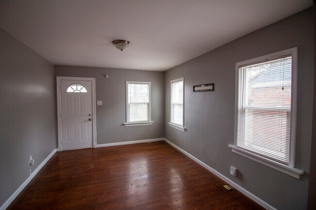 Building Photo - 6817 Raymond Ave