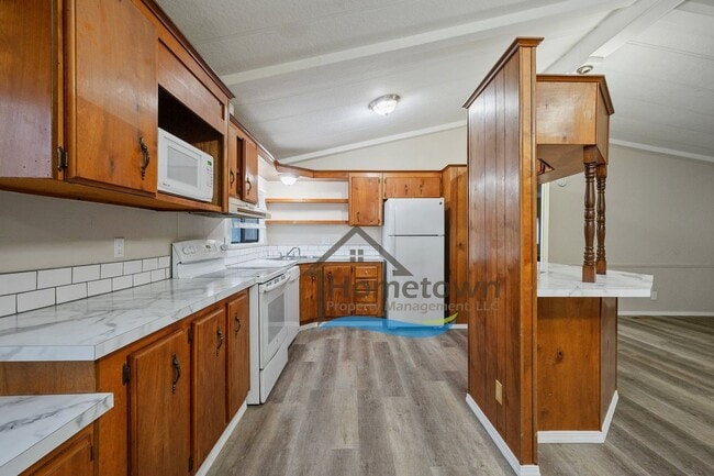 Building Photo - 3 Bedroom 2 Bathroom Home with Carport Available in Coeur d'Alene!
