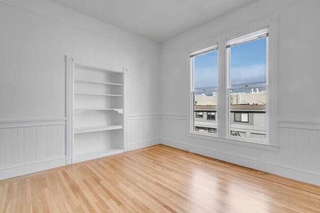 Building Photo - Remodeled pet friendly, top floor 2BR with in-unit laundry