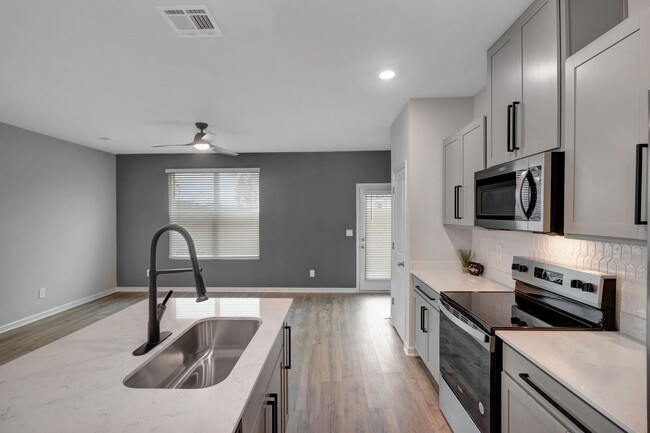 Building Photo - BRAND NEW 3 BEDROOM 3 BATH TOWNHOME WITH U...