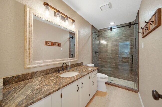 Building Photo - Welcome to your lakeside sanctuary in the ...