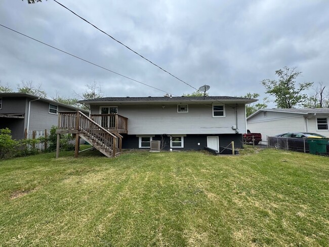 Building Photo - 541 W 67th Ln