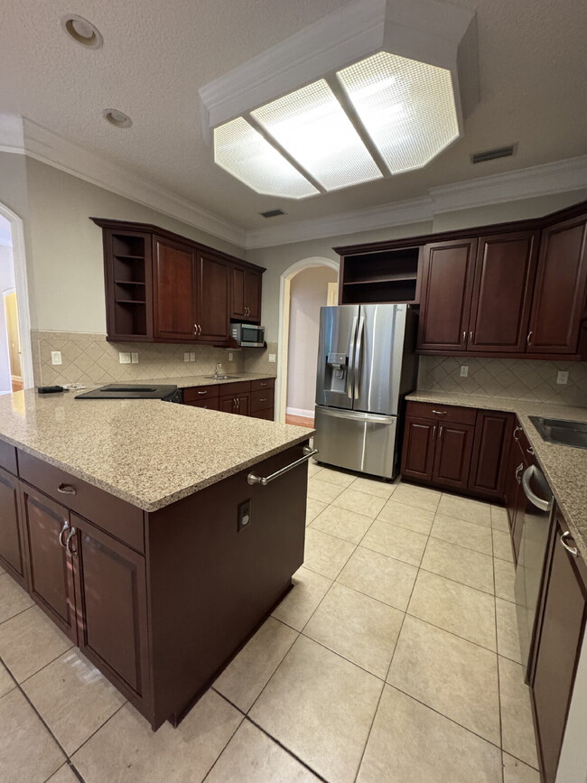 Building Photo - 4 bedroom 4 bath in gated community in Ora...
