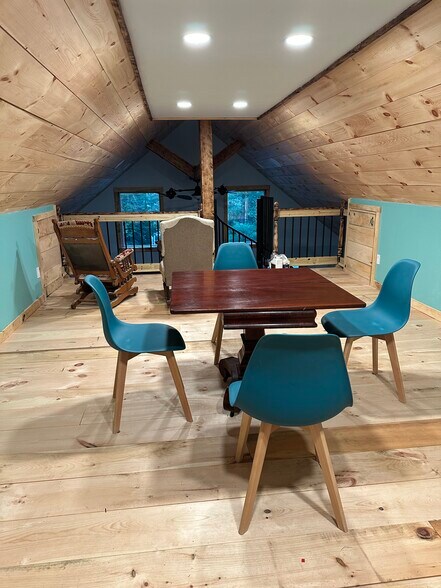 loft space overlooking the living room and water - 63 Hall Rd