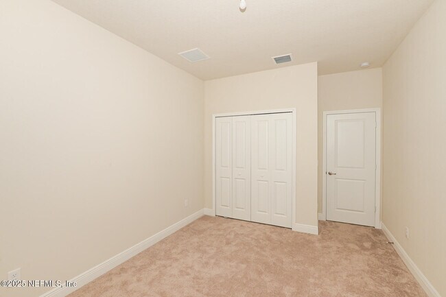Building Photo - 10976 SW Tessili Wy