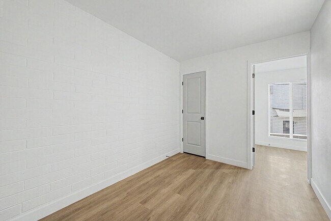 Building Photo - Spacious 2 Bed + Bonus Room | Large Private Yards | Covered Parking | 8 Weeks Free Rent!