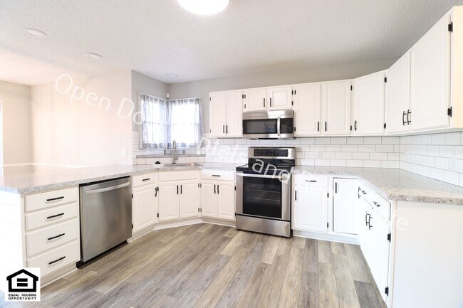 Building Photo - 4 bedroom home now available!