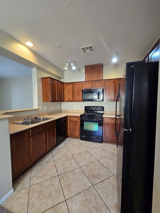 Building Photo - A hard to find 2 Bedroom + A Den with a On...