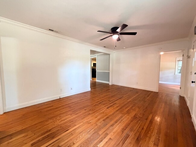 Building Photo - Historic Downtown Charm | Original Floors | Walk to Golf, Dining, Parks, & Concerts