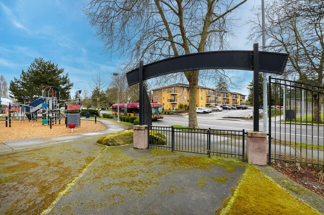 Building Photo - Spacious Two-Bedroom, Two-Bath Living at Marigold Apartments — Available Now