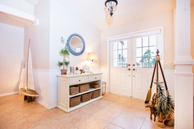 Building Photo - ANNUAL RENTAL - Beach Cottage with 2 Car Garage 'The Lakehouse' in tropical garden