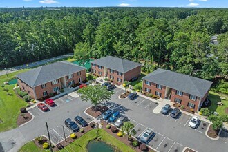 Building Photo - ??You had me at walk-in closet?? 1st Floor Immaculate 1 bedroom for rent in Sunny Myrtle Beach SC!