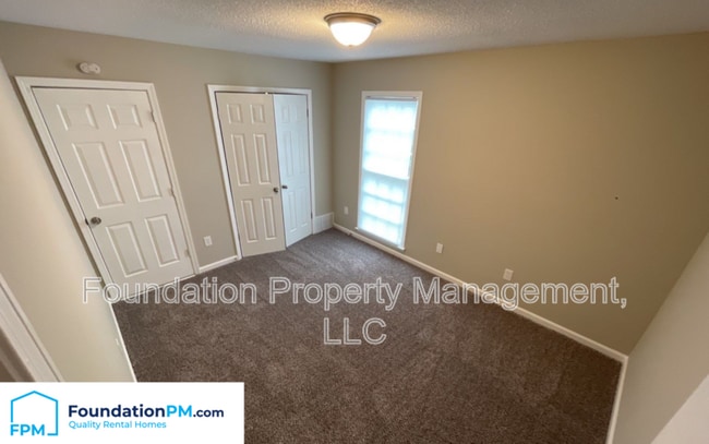 Building Photo - 5574 Blossom Ln