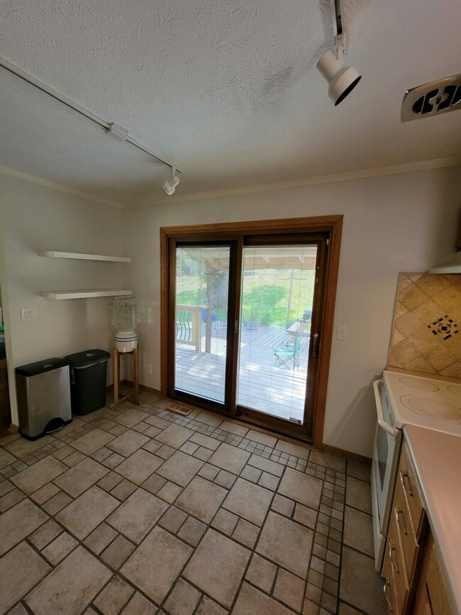 Kitchen-View of Backdoor - 3706 N 93rd St