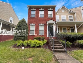 Building Photo - 2 Bed/2.5 Bath Townhome with Fenced Yard & Garage / Pet-Friendly / Available Now!