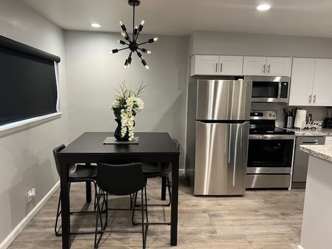 Building Photo - Move-In Ready, Fully Furnished Condo – Prime Strip Location