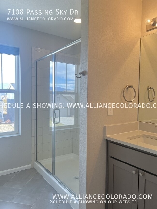 Building Photo - 7108 Passing Sky Dr