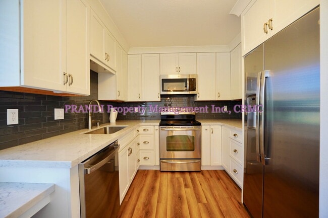 Building Photo - "Charming 1-Bed Condo Retreat in Greenbrae – Spacious 894 Sq Ft Living!"