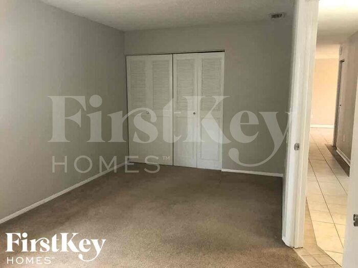 Building Photo - 8275 Jacaranda Ave