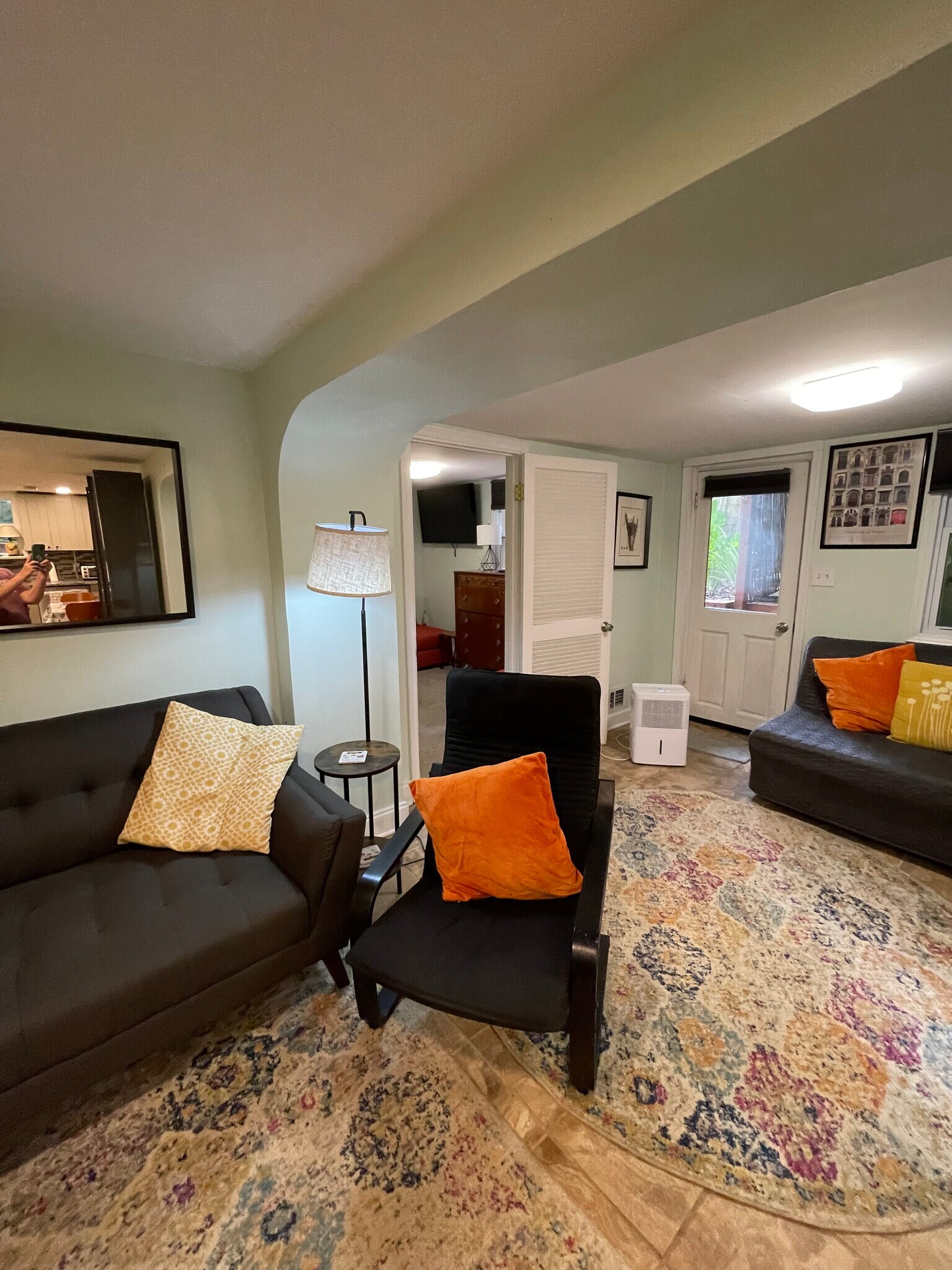 Living room w/pull out sofa and back door - 1060 Seaboard Ave NW