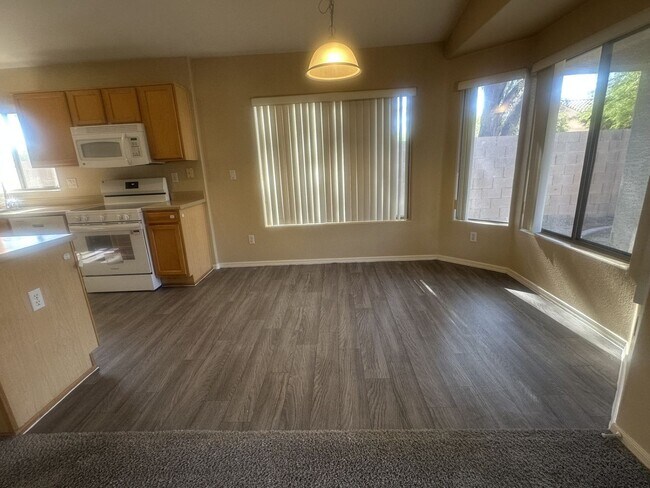 Building Photo - Rare single-level home offers 5 bedrooms and a versatile floor plan designed for comfortable living