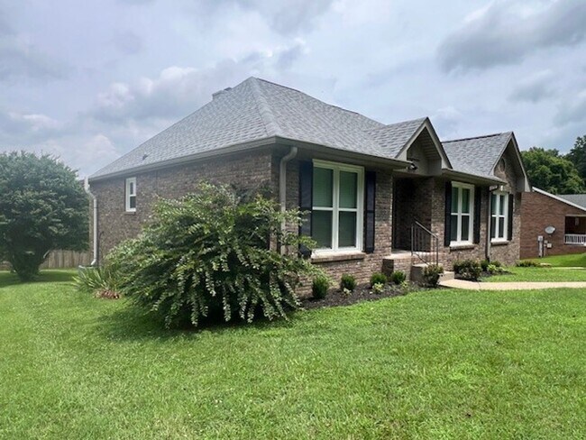 Building Photo - Beautiful Brick Home With 2 Car Garage