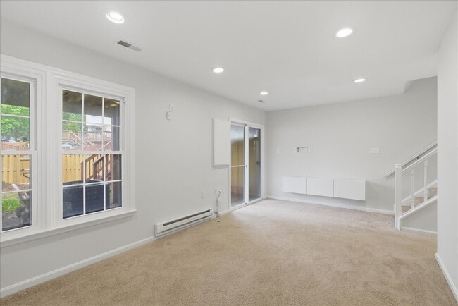 Building Photo - Welcome home to this beautifully updated and move-in-ready 3-bedroom, 3.5-bath townhouse