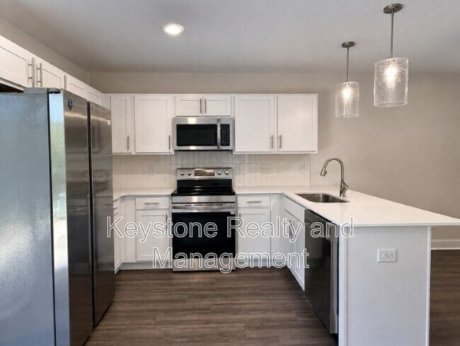 Building Photo - 1204 Woodland Vly Ln