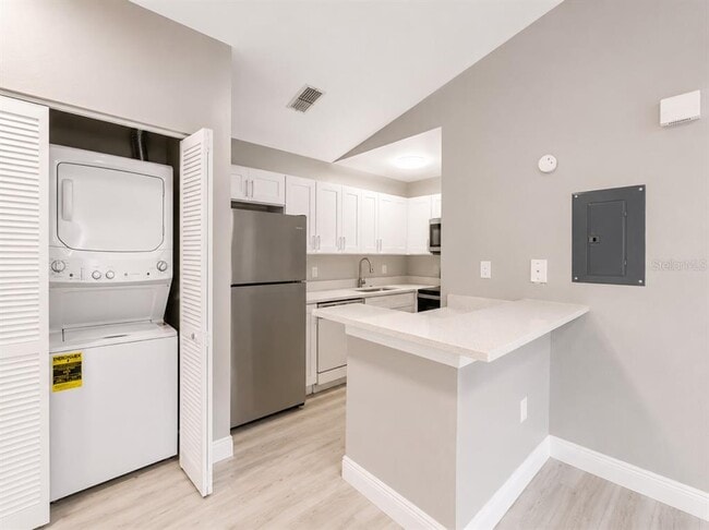 Building Photo - 9160 Lake Chase Island Way
