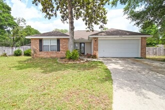 Building Photo - Updated Fox Hollow 3BR Home Near 9 Mile Rd with LVP Flooring, Granite Kitchen, 2-Car Garage & Fen...