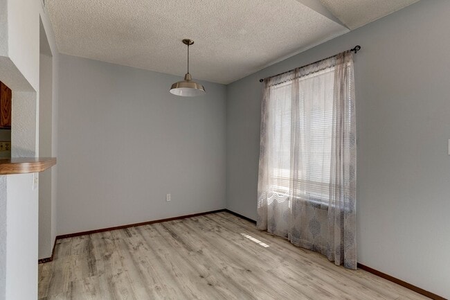 Building Photo - Charming 2-Bedroom Condo with Balcony – Pr...