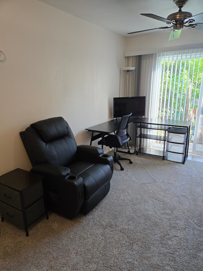 View from bed area into living room area. - 7649 Beckett St