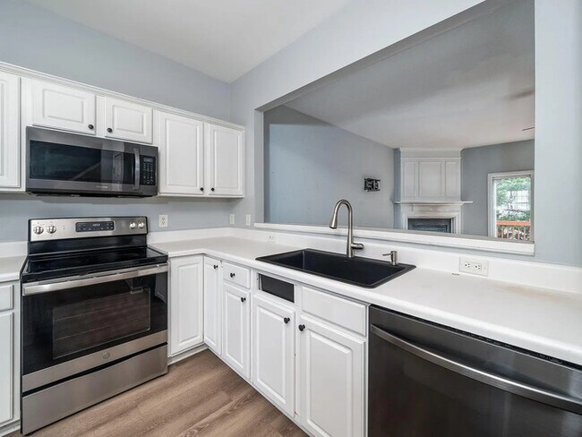 Building Photo - Earn Wealth While Leasing - Like a Homeown...