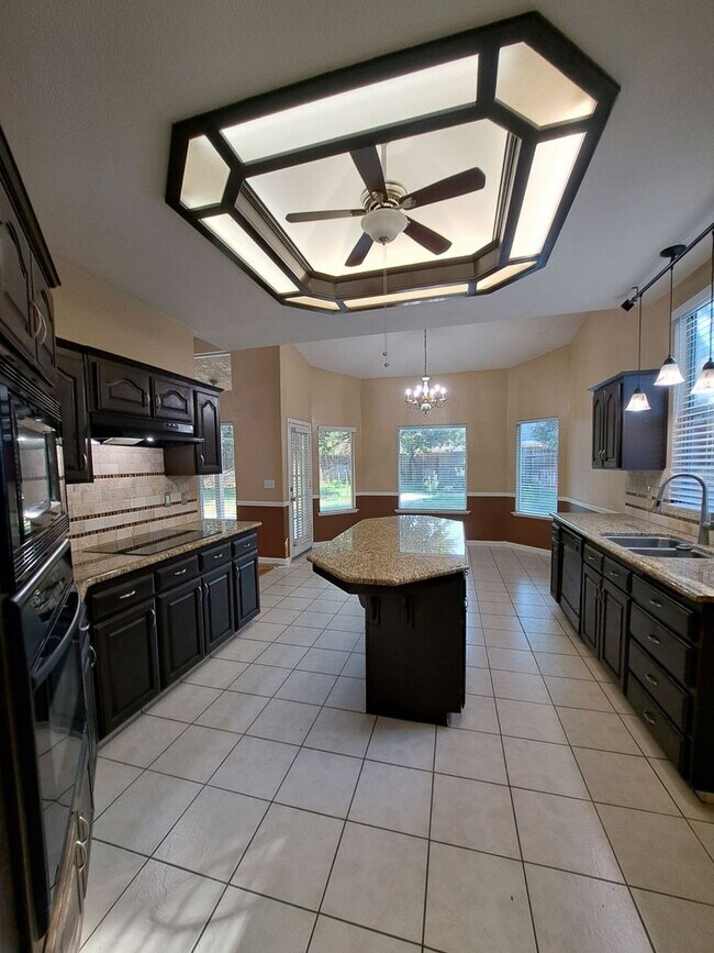 Building Photo - Move in Special: Half OFF your 1st Month's Rent! Elegant 4 Bedroom Home w/ Upstairs Loft Move in ...